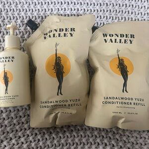 (2) Wonder Sandalwood Yuzu Hair Conditioner Refill - Cream 1 used reusable pump